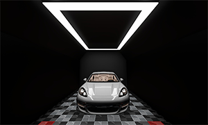 Wide detailing area with black-and-white interlocking flooring and geometric LED ceiling lights